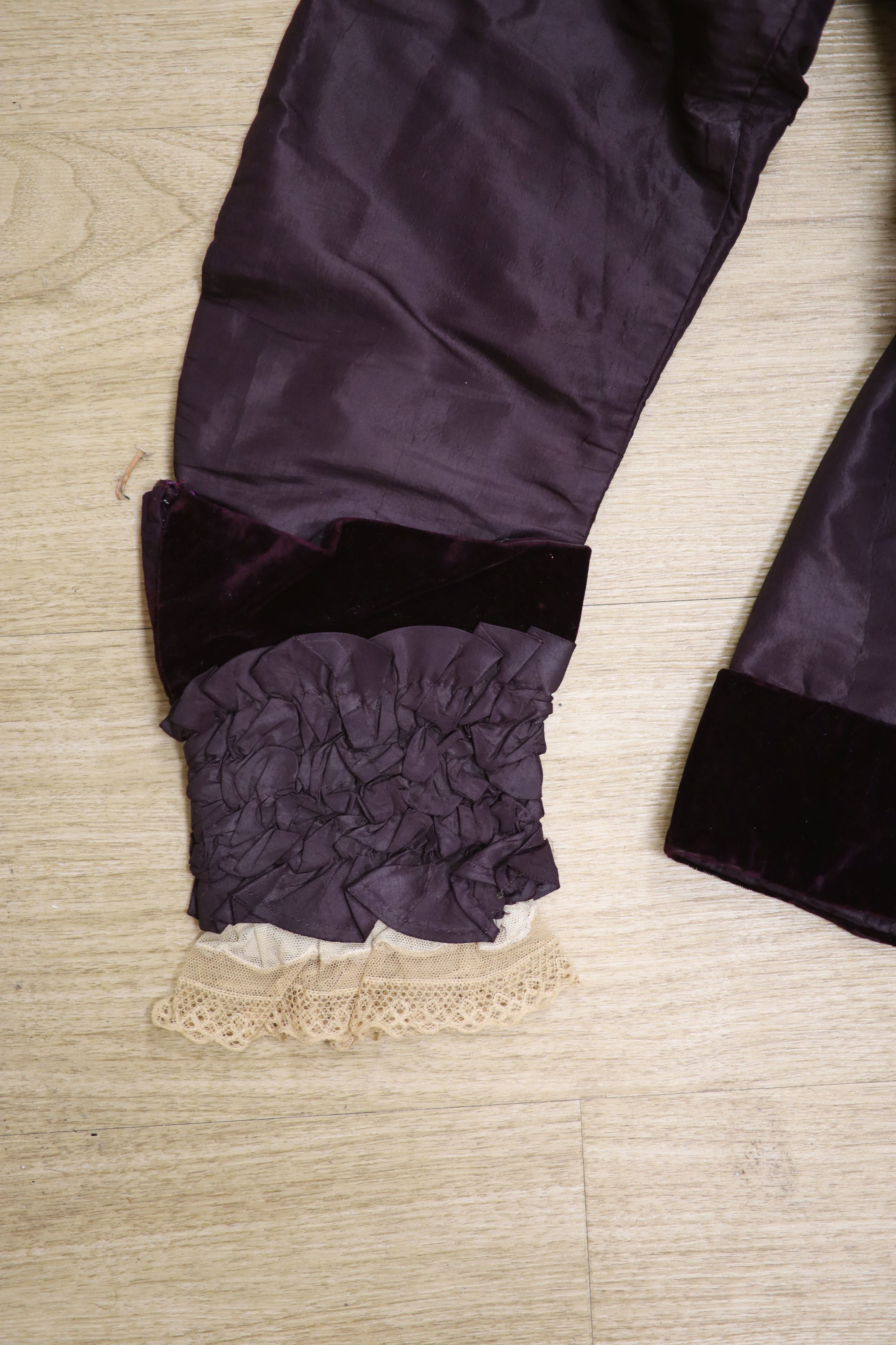 A Victorian black silk jacket and skirt, a child's white lawn dress, a black silk fringed petite point shawl and a fine silk shawl etc